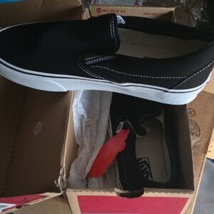 Vans Men's Black and White Slip-On Sneakers